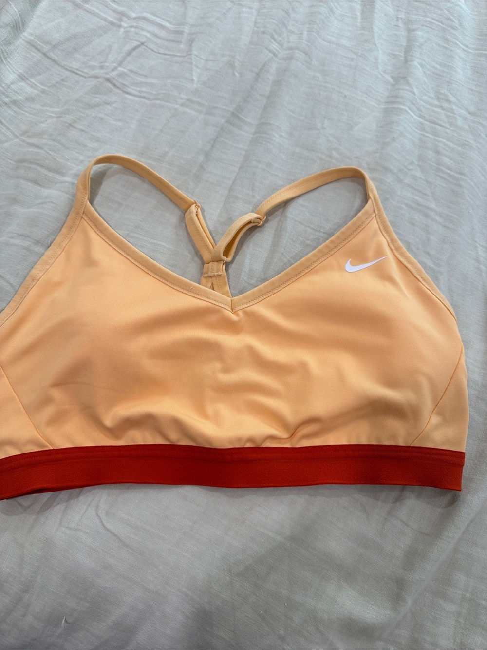 Nike Peach Sports Bra with orange Contrast Band. XL
